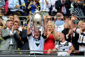 Hull's captain Gareth Ellis lifts the Challenge Cup trophy at Wembley in 2016. Picture: Jonathan Gawthorpe