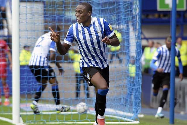 Happy days: Dennis Adeniran celebrates his goal in the derby win over Doncaster Rovers.  Picture: Steve Ellis