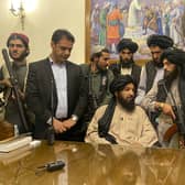 Taliban fighters take control of Afghan presidential palace after the Afghan President Ashraf Ghani fled the country, in Kabul, Afghanistan.