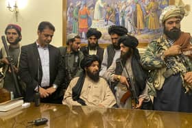 Taliban fighters take control of Afghan presidential palace after the Afghan President Ashraf Ghani fled the country, in Kabul, Afghanistan.