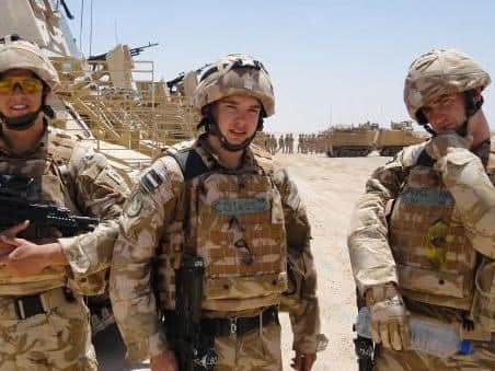 Trooper James Leverett (left) in Afghanistan