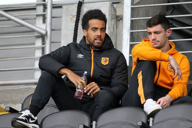 Hull City's Tom Huddlestone (left) is now back in Hull City colours.
