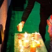 Members of the public light candles as they attend a vigil for the community in Plymouth, Devon, where five people were killed by gunman Jake Davison in a firearms incident last Thursday evening.