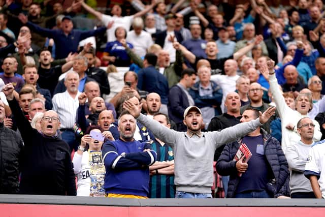 Leeds United fans in the stands at Old Trafford. Picture: PA.