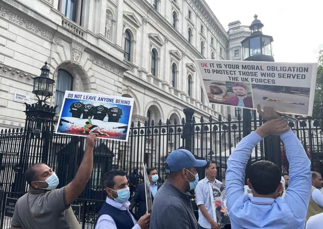 Former Afghan interpreters and veterans hold a demonstration outside Downing Street in London, calling for support and protection for Afghan interpreters and their families.