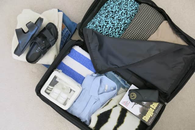A peek inside Georgia Earnshaw's staycation wardrobe suitcase.