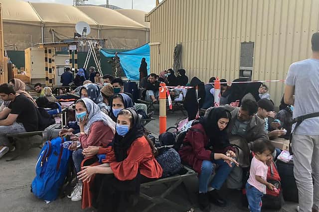 People waiting to be evacuated from Kabul.
