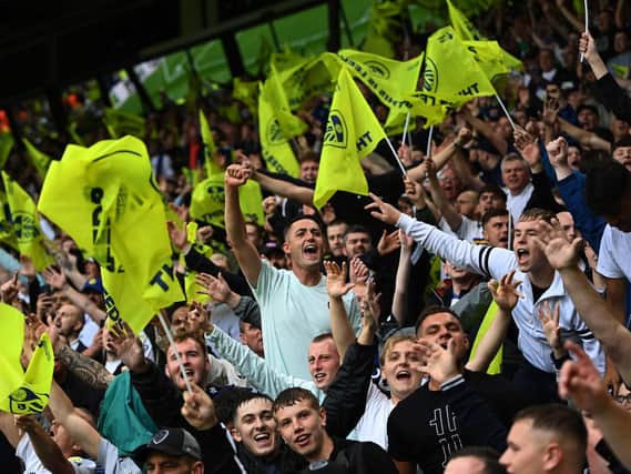 Vibrant scenes as Leeds United welcome back a full house of supporters for the first time in 532 days. Picture: Jonathan Gawthorpe.