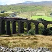 The Flying Scotsman makes its way over Arten Gill viaduct in the Yorkshire Dales.