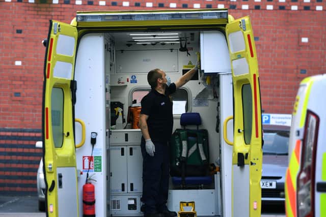An ambulance is cleaned down at Leeds Geberal Infirmary during the pandemic. Photo: Jonathan Gawthorpe.