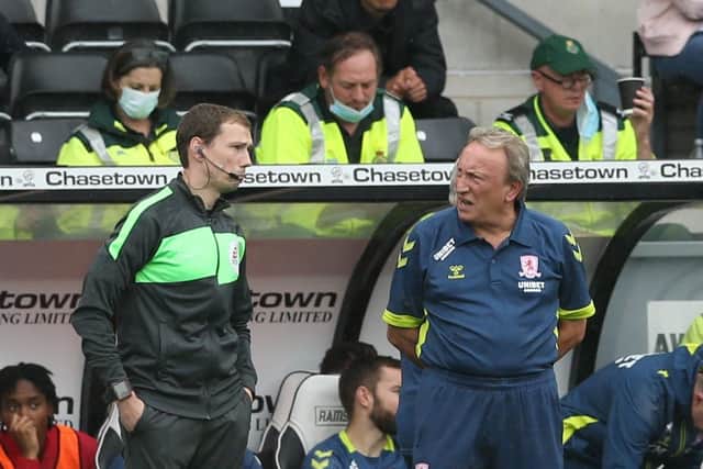 NOW THEN ... Middlesbrough manager Neil Warnock (right) speaks with the fourth official at Pride Park. Picture: Barrington Coombs/PA