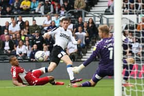 NO WAY THROUGH: Derby County's Max Bird sees his shot saved by Middlesbrough goalkeeper Joe Lumley during the Championship match at Pride Park. Picture: Barrington Coombs/PA