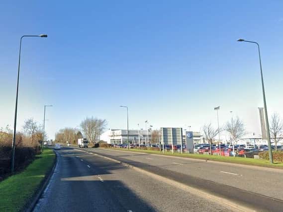 The girl fell from the car which was travelling along the A180 in Grimsby
