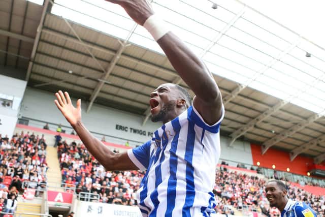 JOY: Dominic Iorfa celebrates Sheffield Wednesday's League One win at Rotherham United with away fans
