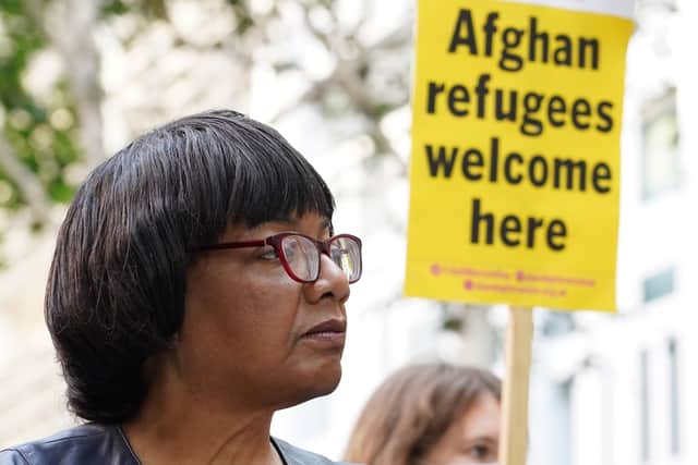 Diane Abbott attends a protest by Stand Up to Racism and the Afghan Human Rights Foundation outside the Home Office in Westminster, central London. The two organisations have condemned Home Secretary Priti Patel's decision to only allow 5,000 refugees into Britain from Afghanistan this year as "woefully inadequate".