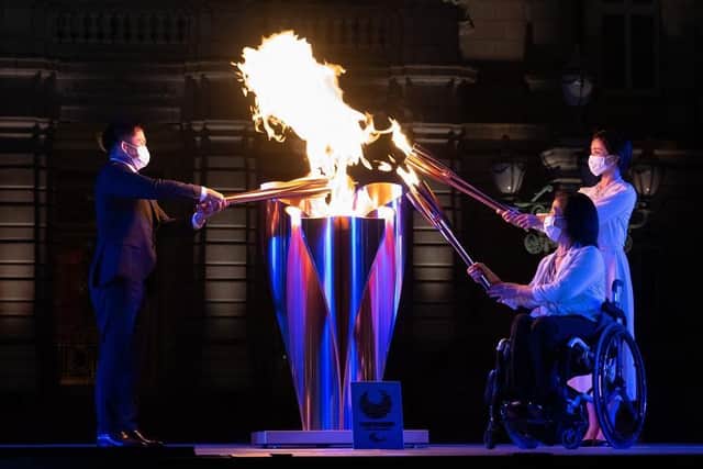 The flame lighting at the Tokyo 2020 Paralympic torch relay. (Pic credit: Carl Court / 2021 Getty Images)