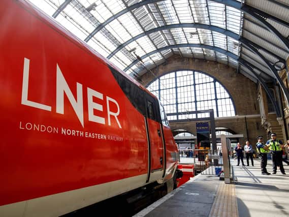 Timetables changes on the East Coast Main Line are being delayed for at least a year. Picture: TOLGA AKMEN/AFP/Getty Images