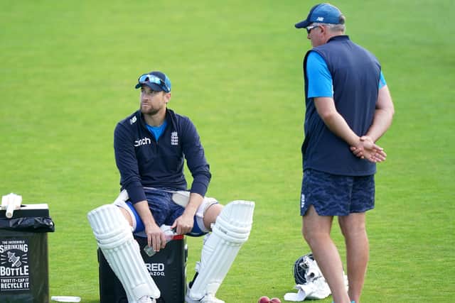 England's Dawid Malan (left) and head coach Chris Silverwood during a nets session. Picture: PA