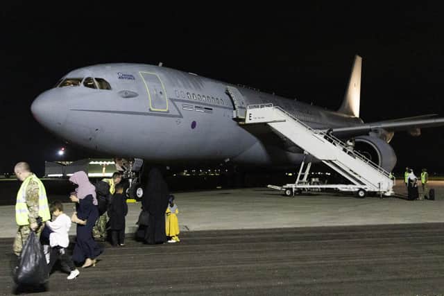 .Ministry of Defence handout photo of passengers disembarking a Royal Air Force Voyager after arriving at RAF Brize Norton from the Middle East. Boris Johnson and other G7 leaders have failed to persuade the US to keep troops in Afghanistan to continue evacuation efforts past the end of the month. Picture date: Tuesday August 24, 2021. PA Photo.