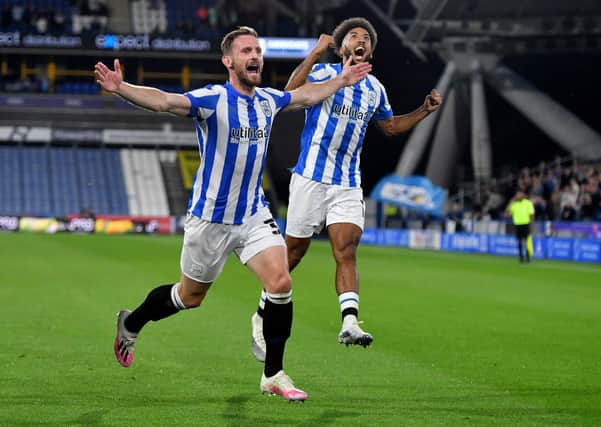 Huddersfield Town's Tom Lees celebrates after scoring his side's equaliser. Picture: PA