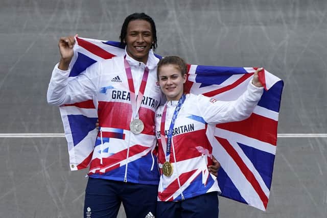 Bethany Shriever and Kye Whyte, right, celebrate their Gold and Silver medals respectively for the Cycling BMX Racing at the Tokyo 2020 Olympics. Picture: Danny Lawson/PA