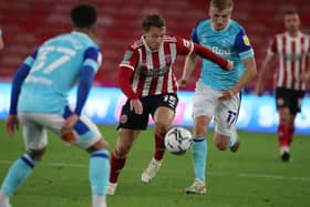 Sheffield United's Luke Freeman gets away from Louie Sibley of Derby County during the Carabao Cup match at Bramall Lane. Picture: Alistair Langham/Sportimage
