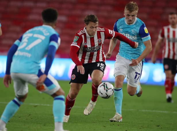 Sheffield United's Luke Freeman gets away from Louie Sibley of Derby County during the Carabao Cup match at Bramall Lane. Picture: Alistair Langham/Sportimage