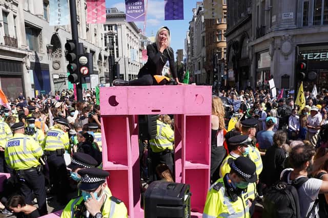 Demonstrators during a protest by members of Extinction Rebellion at Oxford Circus, in central London, this week.