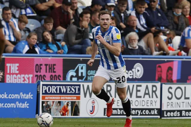 STANDING UP: Huddersfield Town's Ollie Turton is the most natural deputy for injured team-mate Pipa. Picture: John Early/Getty Images