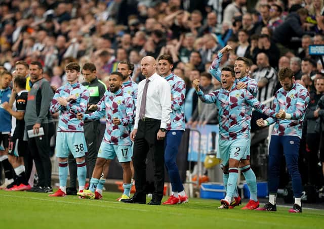 Burnley manager Sean Dyche and bench react at full time during the Carabao Cup second round match at St James' Park, Newcastle. Picture: PA