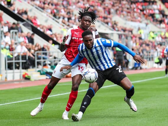 CALL-UP: Josh Kayode battles for possession with Sheffield Wednesday's Chey Dunkley in the recent South Yorkshire derby