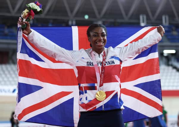 GOLDEN MOMENT: Leeds' Kadeena Cox celebrates on the podium after winning the gold medal women's C4-5 500m cycling time trial at Tokyo 2020 Paralympic Games today. Picture: Kiyoshi Ota/Getty Images.
