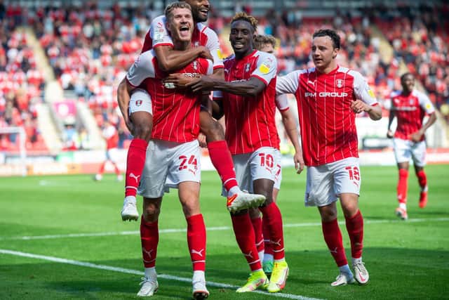 GOALSCORER: Michael Smith celebrates with his team-mates
