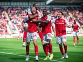 GOALSCORER: Michael Smith celebrates with his team-mates