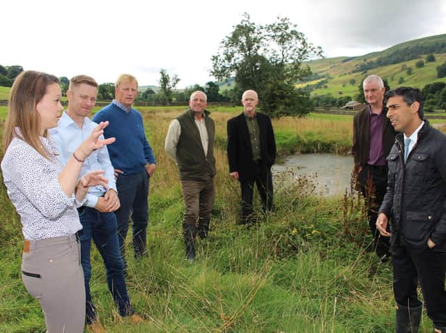 Rishi Sunak hears about how the scheme has worked with, from left, Marie Taylor, YDRT operations director; David Middlemiss YDRT CEO; Robert Brown YRDT trustee; Andy Whitell of Ribba Hall and Wes Wilcox and Dr Neale Hall of Dales Land Net – soil moisture monitoring equipment suppliers.
