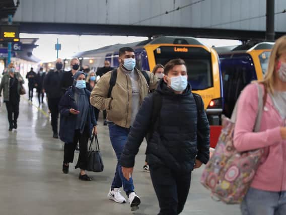 Passengers at Leeds railway station in December 2020. Picture: Danny Lawson/PA