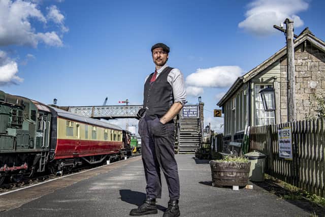 Carriage and wagon manager Aaron Marsden by the historic buffet car