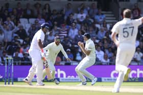 England's Craig Overton celebrates with England's Jonny Bairstow after taking the wicket of India's Rishabh Pant on day four at the Emerald Headingley. Picture: Nigel French/PA