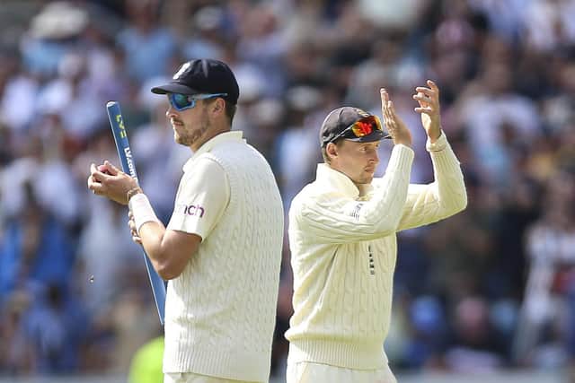 England's Joe Root (right) claps the fans after victory over India during day four at the Emerald Headingley. Picture: Nigel French/PA