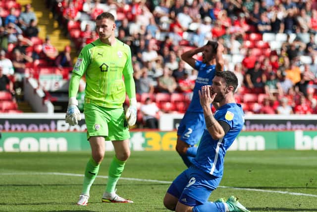 Birmingham City's Scott Hogan reacts after a missed chance at Oakwell. Picture: Isaac Parkin/PA
