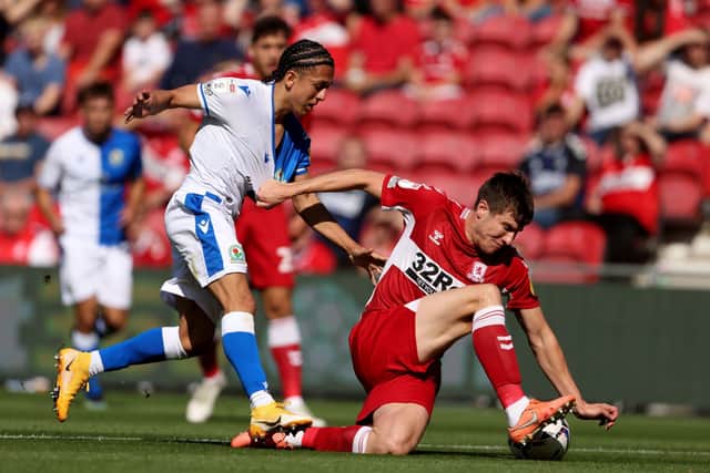 Middlesbrough's Paddy McNair holds off Blackburn Rovers' Ian Poveda at the Riverside Stadium. Picture: Richard Sellers/PA