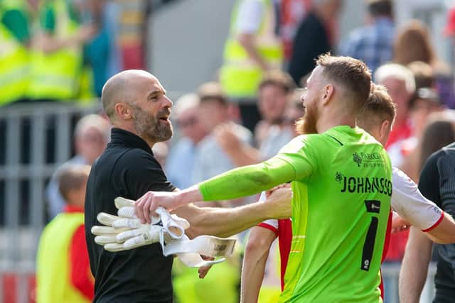 Paul Warne and Viktor Johansson celebrate at full-time after Rotherham United's 2-0 victory over Doncaster Rovers at the New York Stadium   Picture: Bruce Rollinson