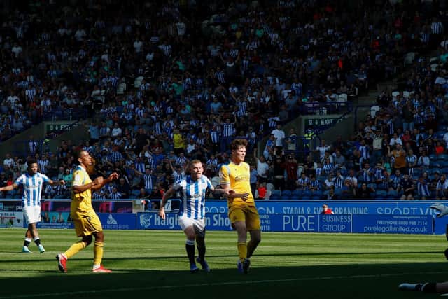 OPENER: Lewis O'Brien scores for Huddersfield against Reading. Picture: Getty Images.