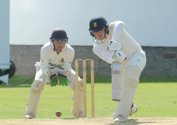 LEADING ROLE: Harry Warwick scored 112 for Townville against New Farnley, keeping his team in the Bradford title race Picture: Steve Riding.