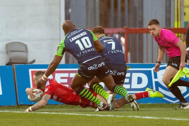 Ben Crooks score's Hull KR's historic opening try against Huddersfield Giants in April. (Picture: Bruce Rollinson)