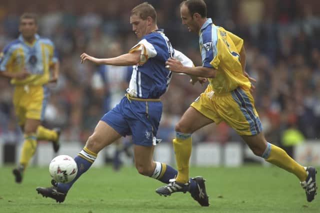Andy Booth of Sheffield Wednesday (left) evades the challenge of Frank Leboeuf of Chelsea as the Owls unbeaten start came to an end (Picture: Clive Brunskill/Allsport)