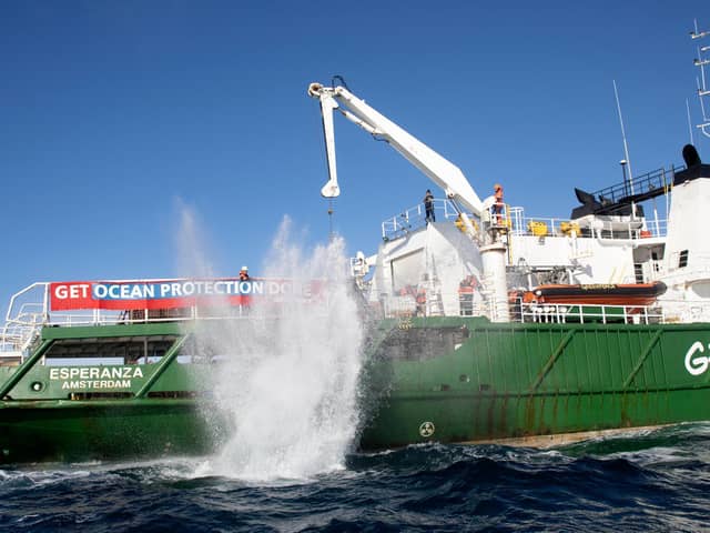 Granite boulders being dropped into the English Channel by Greenpeace Picture:  Suzanne Plunkett/Greenpeace