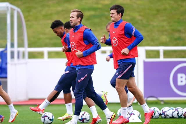 England's Harry Kane (left) and Harry Maguire during a training session at St George's Park, Burton upon Trent. Picture: PA