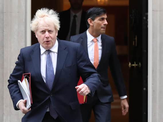 Prime Minister Boris Johnson (left) and Chancellor of the Exchequer Rishi Sunak. Photo: Jonathan Brady/PA Wire.