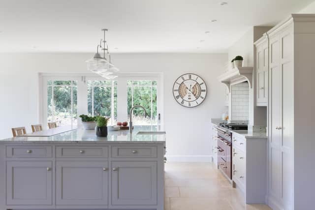 The kitchen is light-filled due to large areas of glazing